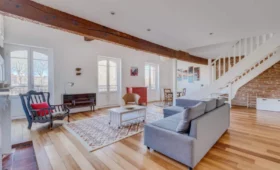 Appartement Laganne à Toulouse – séjour sous les poutres
